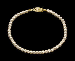 #9586-8 - 4mm Simulated Ivory Pearl Bracelet - 8