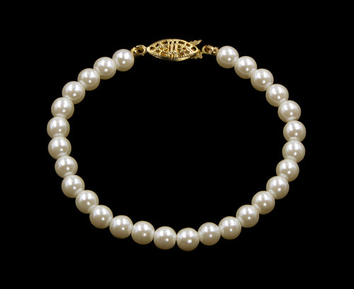 #9588-725 - 6mm Simulated Ivory Pearl Bracelet - 7.25